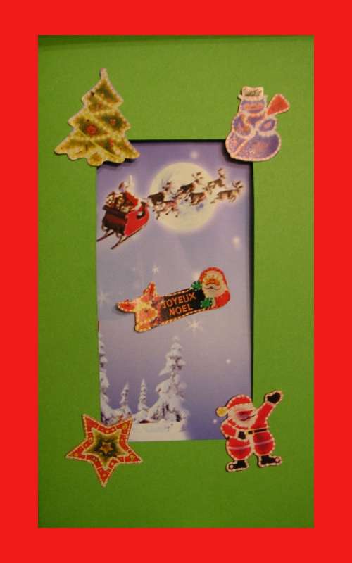 Carte Noël traineau dans le ciel